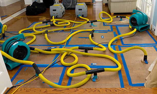 Professional Flood Damage Restoration technician working in Glenmoore, PA